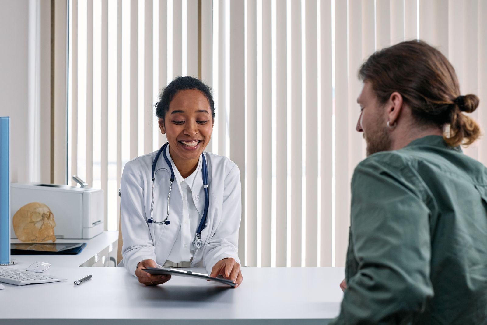A physician talking through options with a patient